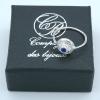 Discreet lapis lazuli round zirconium oxide ring in solid silver