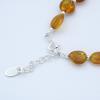 Semi-rigid bracelet Amber oval beads