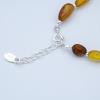 Semi-rigid amber bracelet, mixed oval beads